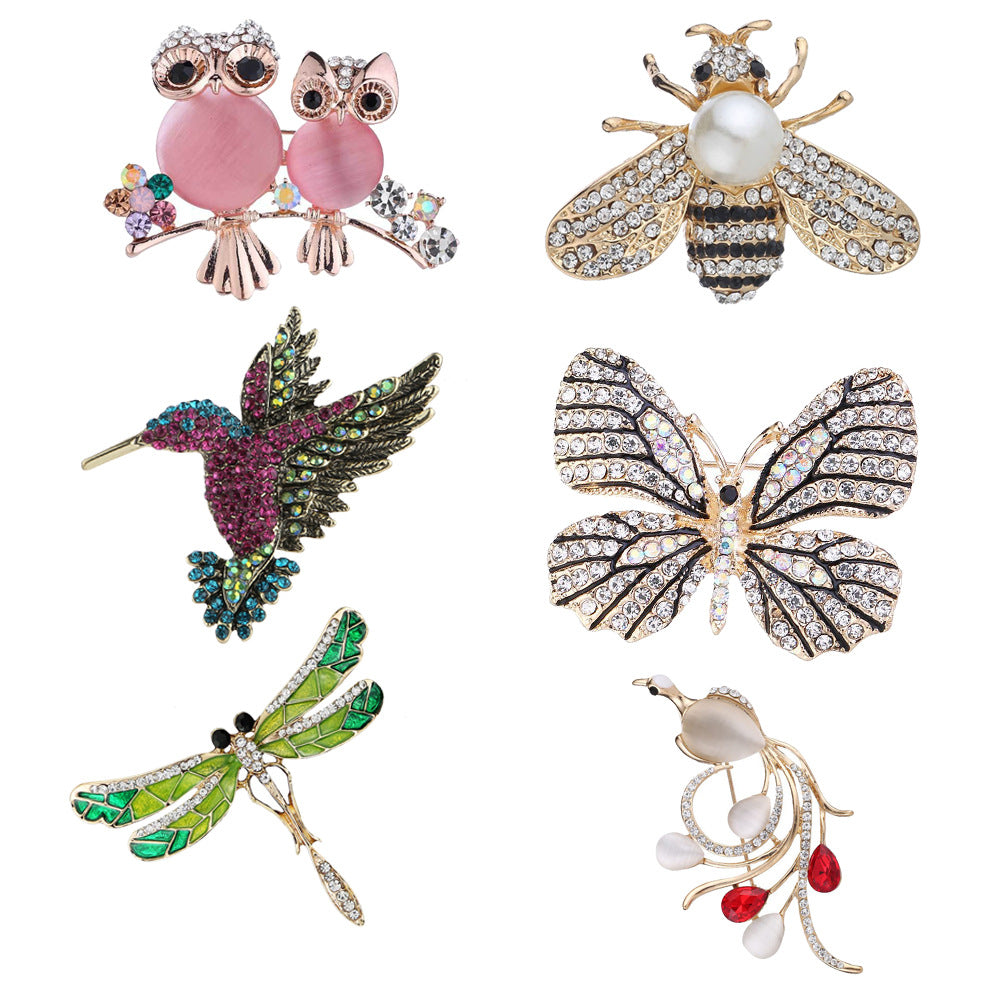Owl motif pin brooch