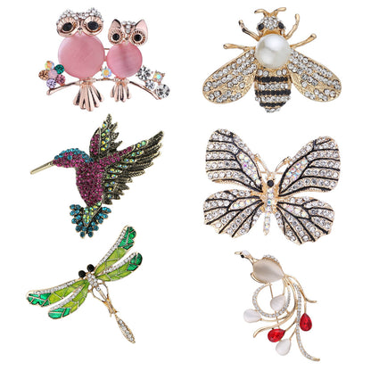 Owl motif pin brooch