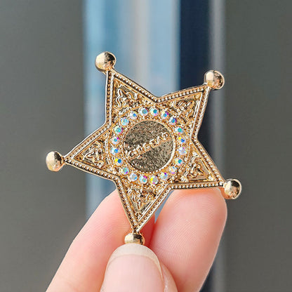 Assorted designs of vintage brooch