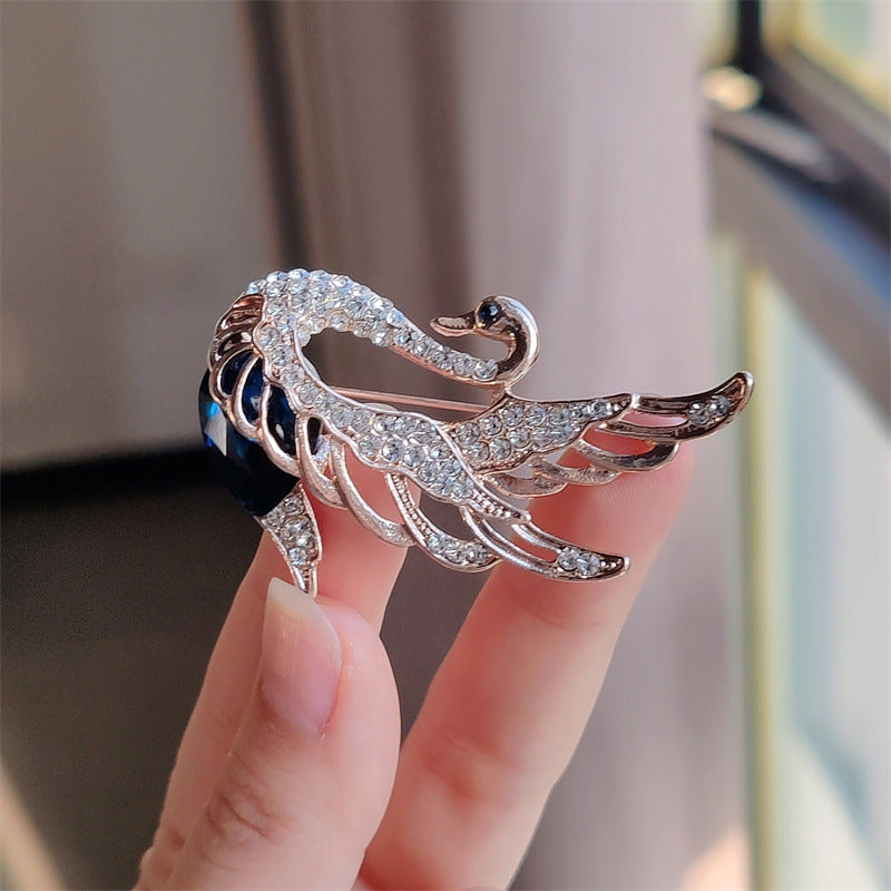 Swan brooch in various colors
