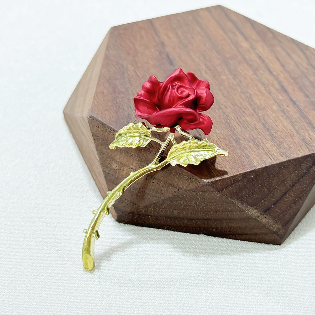 Elegant Red Rose Brooch on model