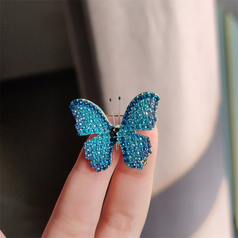 Variations of the butterfly brooch in different colors