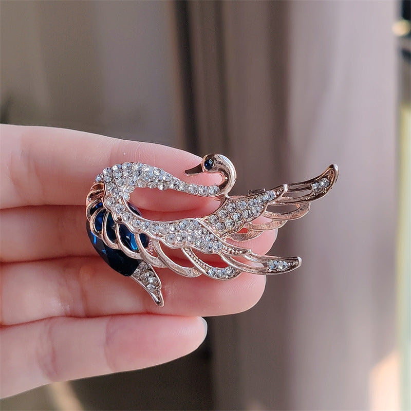Swan brooch in various colors