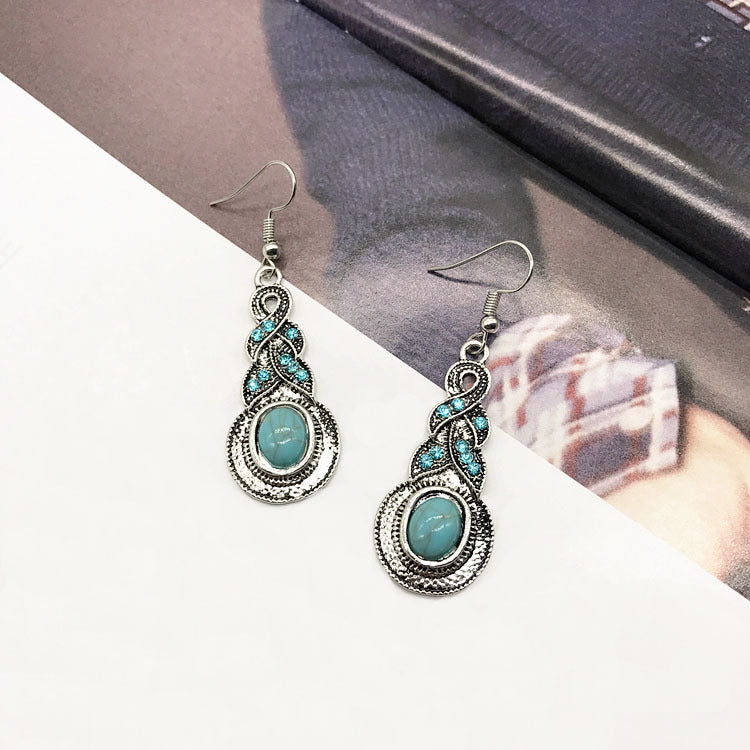 Elegant presentation of jewelry on a fabric background - image 7
