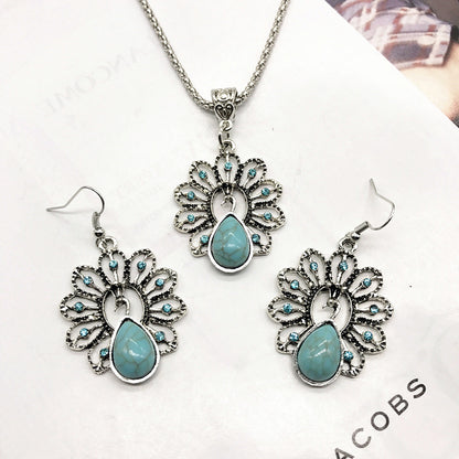 Close-up of turquoise earrings in vintage design - image 2