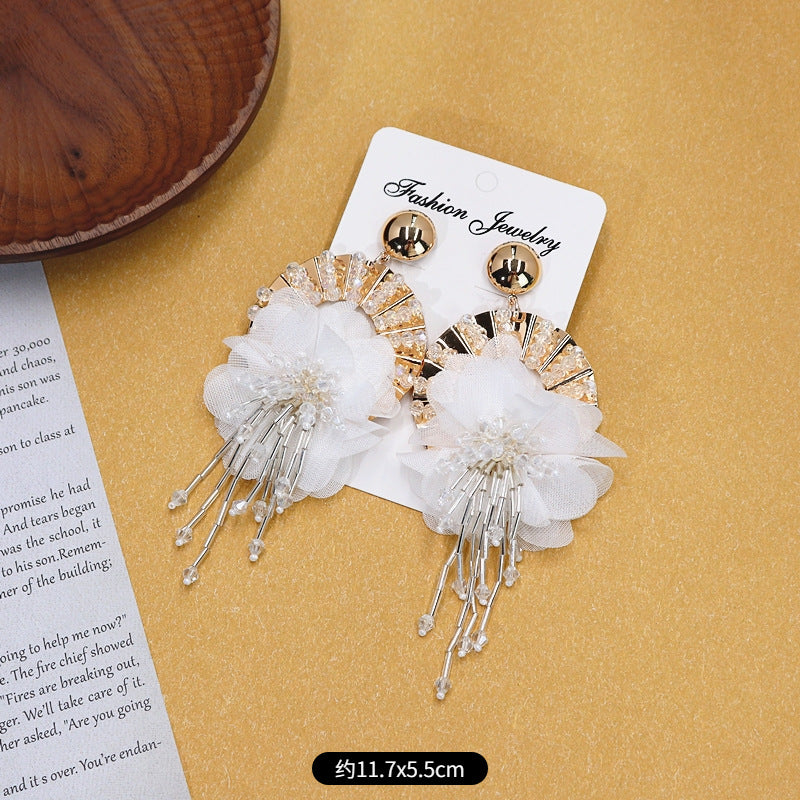 Fashionable earrings with tassels image 5