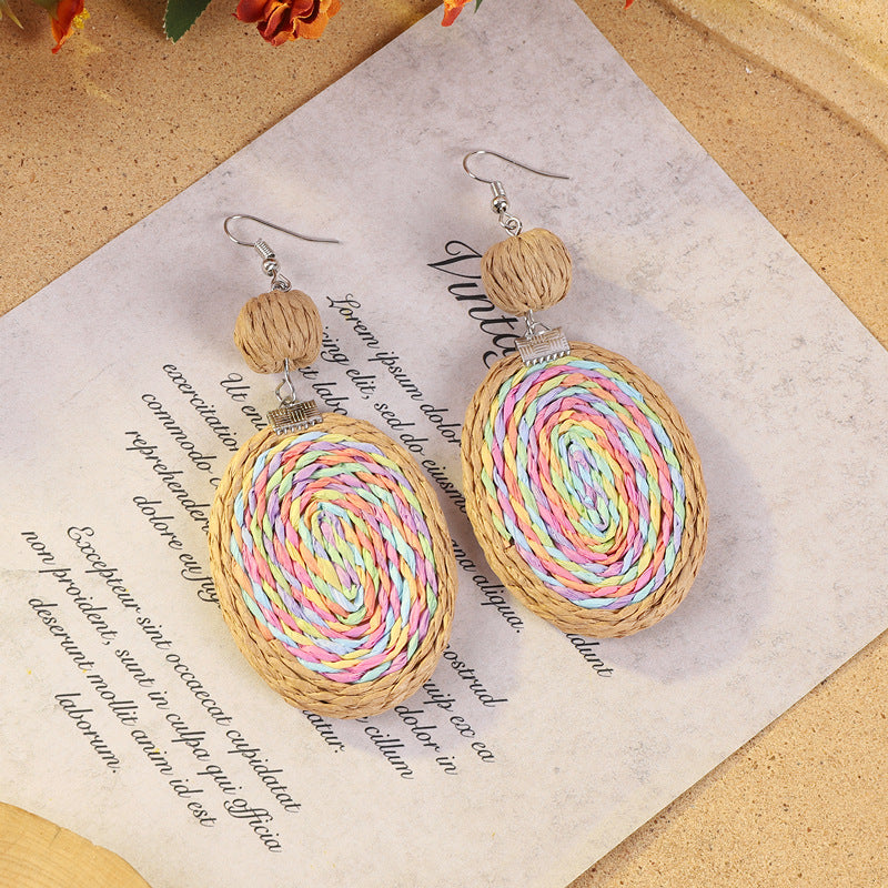 Geometric woven earrings in colorful pattern
