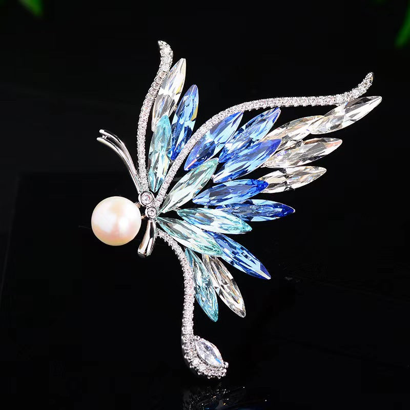 Close up of butterfly brooch with crystals