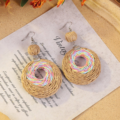 Geometric woven earrings in colorful pattern