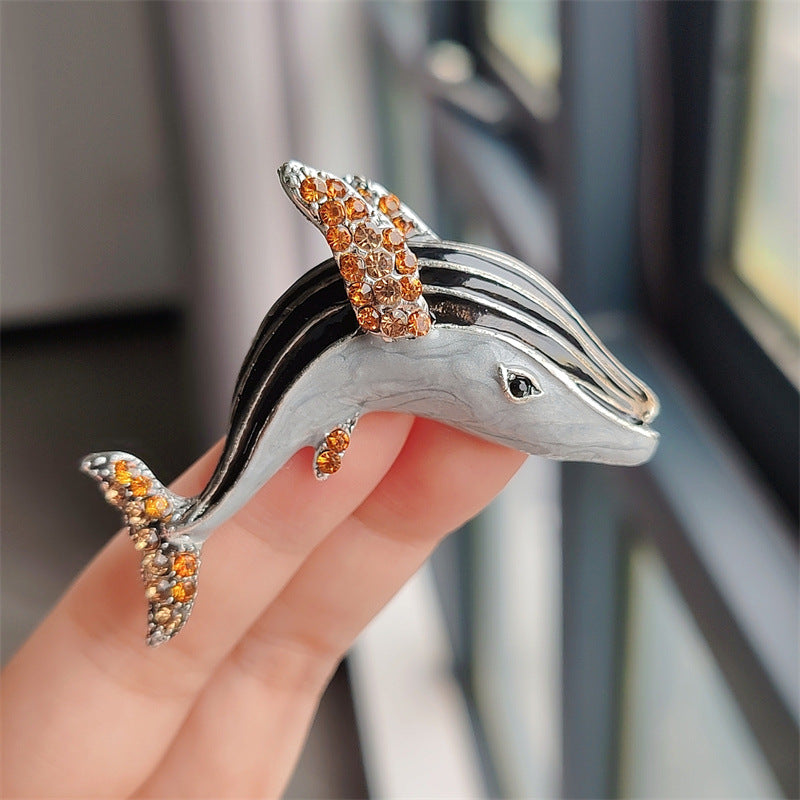 Elegant rhinestone whale and dolphin pin