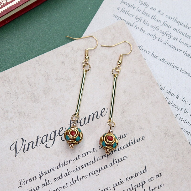 Artistic vintage earrings close-up 3