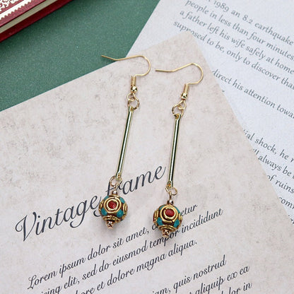 Artistic vintage earrings close-up 3