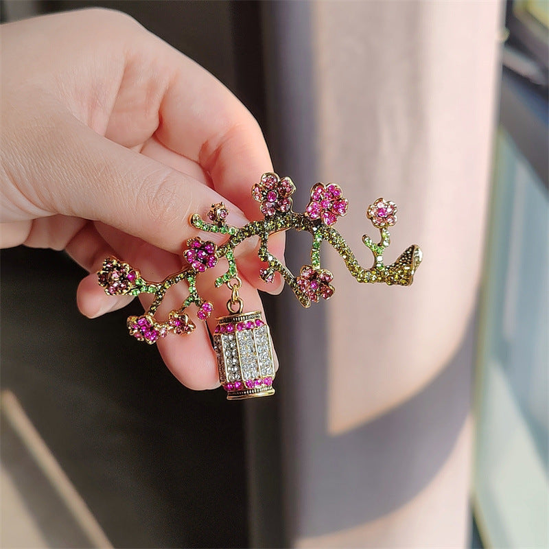 Floral brooch with rhinestones on display