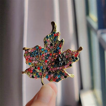 Stylish vintage leaf brooch with colorful crystals - image 1