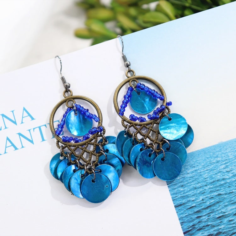 Close up of vintage shell earrings