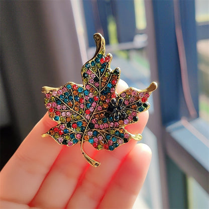 Stylish vintage leaf brooch with colorful crystals - image 1