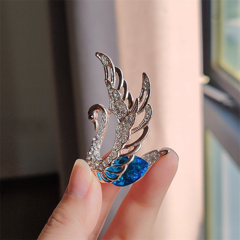 Swan brooch in various colors