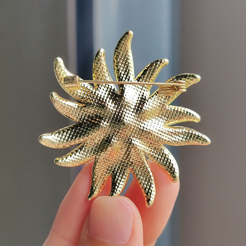 Sunflower brooch on a jacket