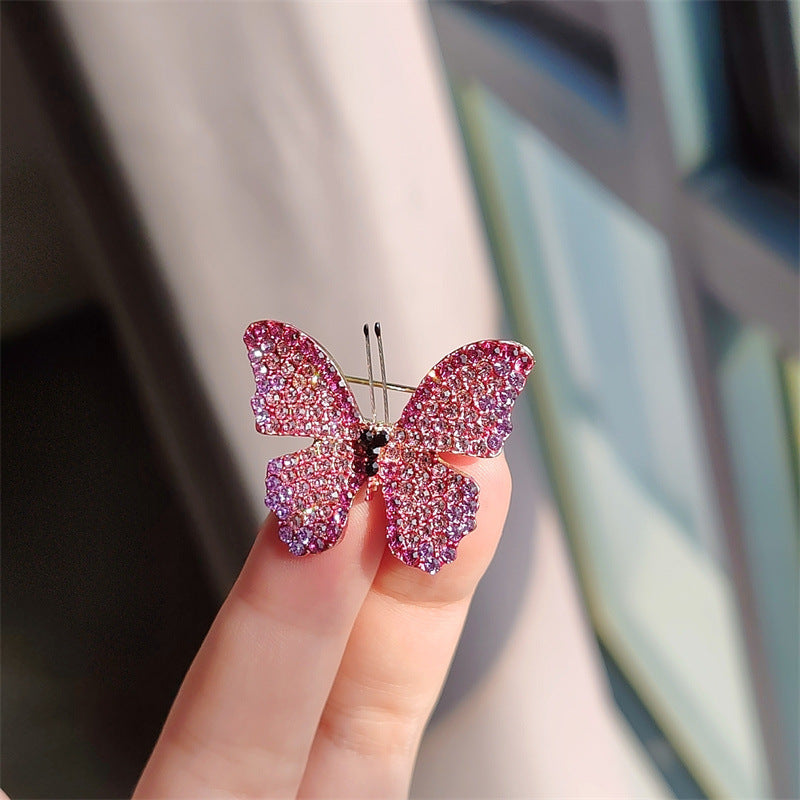 Close-up of the butterfly design on the brooch