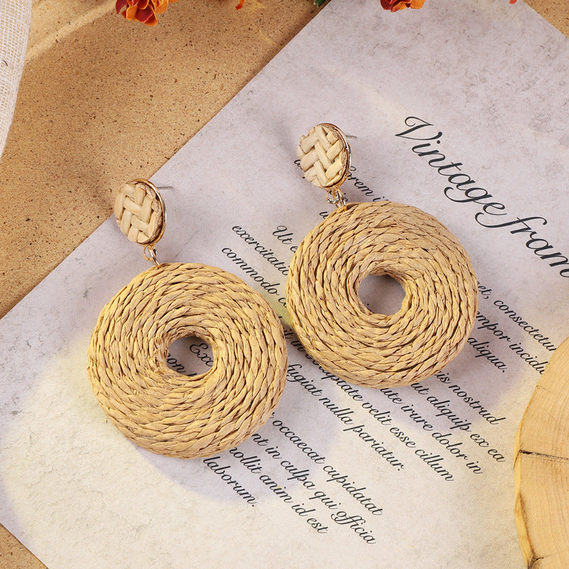 Geometric woven earrings in colorful pattern