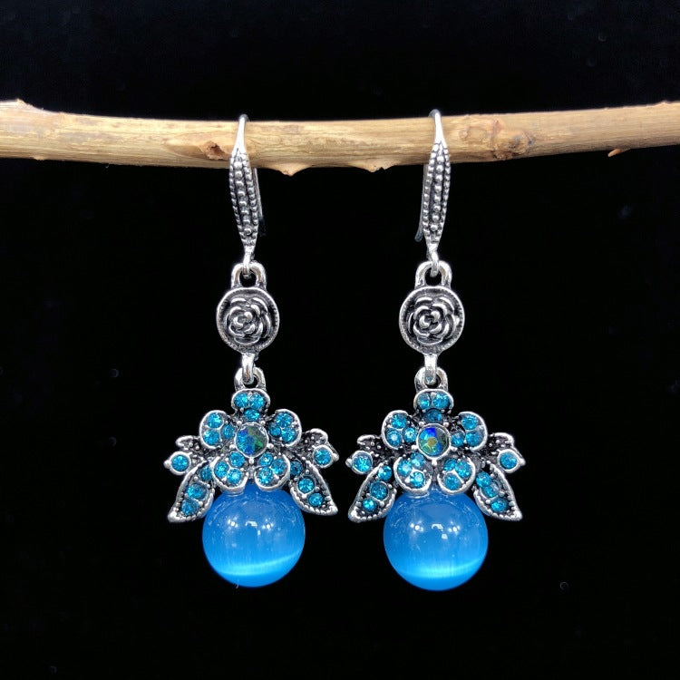 Elegant Cat Eye Stone Earrings with Crystal Details - Image 2