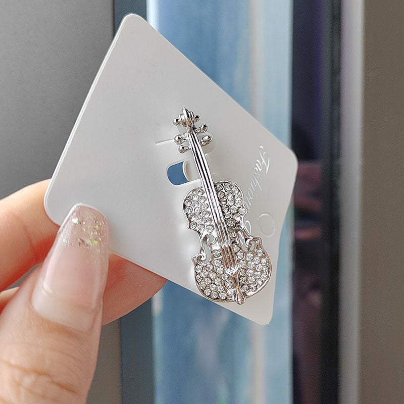 Stylish brooch on a dark background - image 4