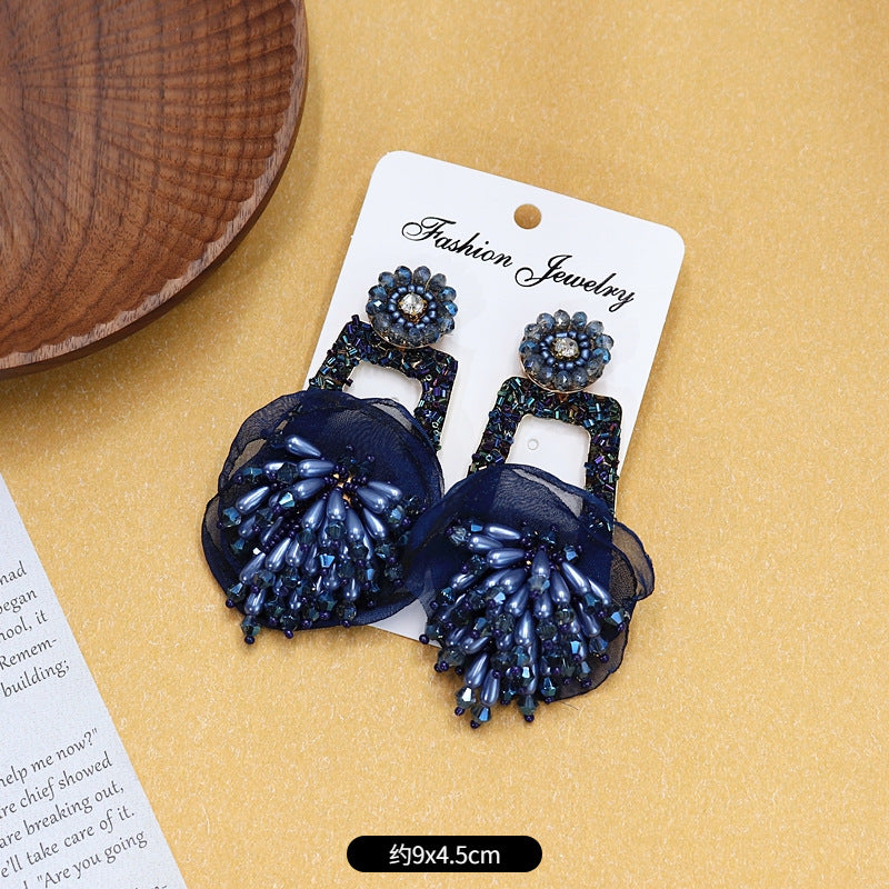 Intricate design detail of tassel earrings image 6