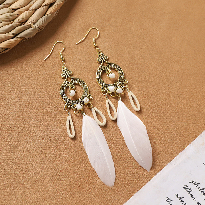 Handcrafted jewelry with feather details