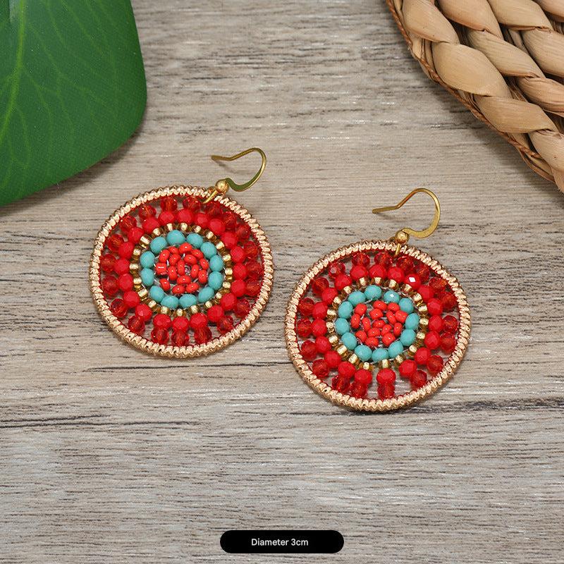 Bohemian earrings hanging in fashion display