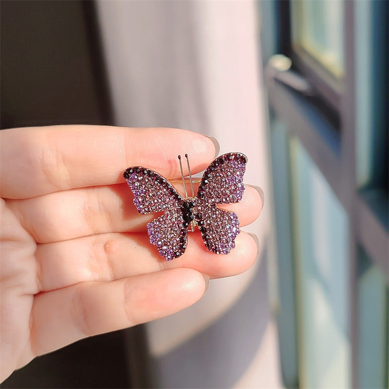 Variations of the butterfly brooch in different colors