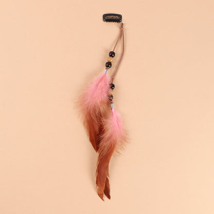 Handmade feather hair clip close-up - image 3