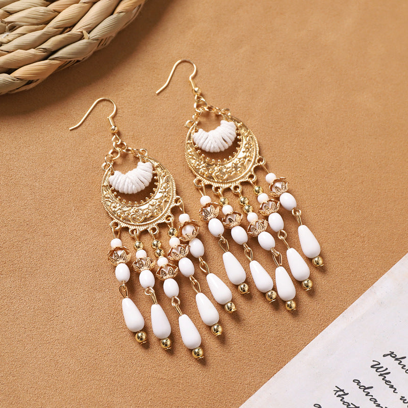 Different style variations of feather earrings