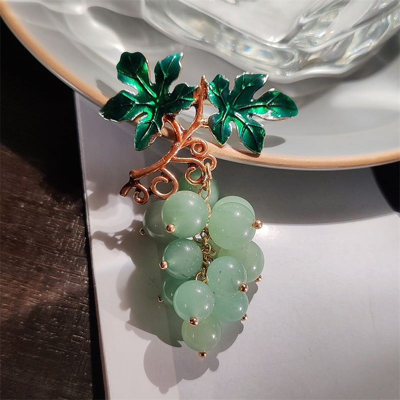 Colorful brooch with sparkling details