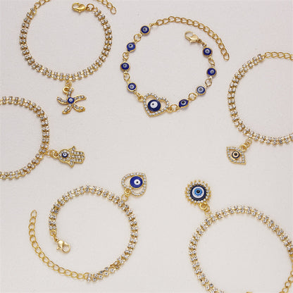 Stylish blue eye and starfish charm bracelet