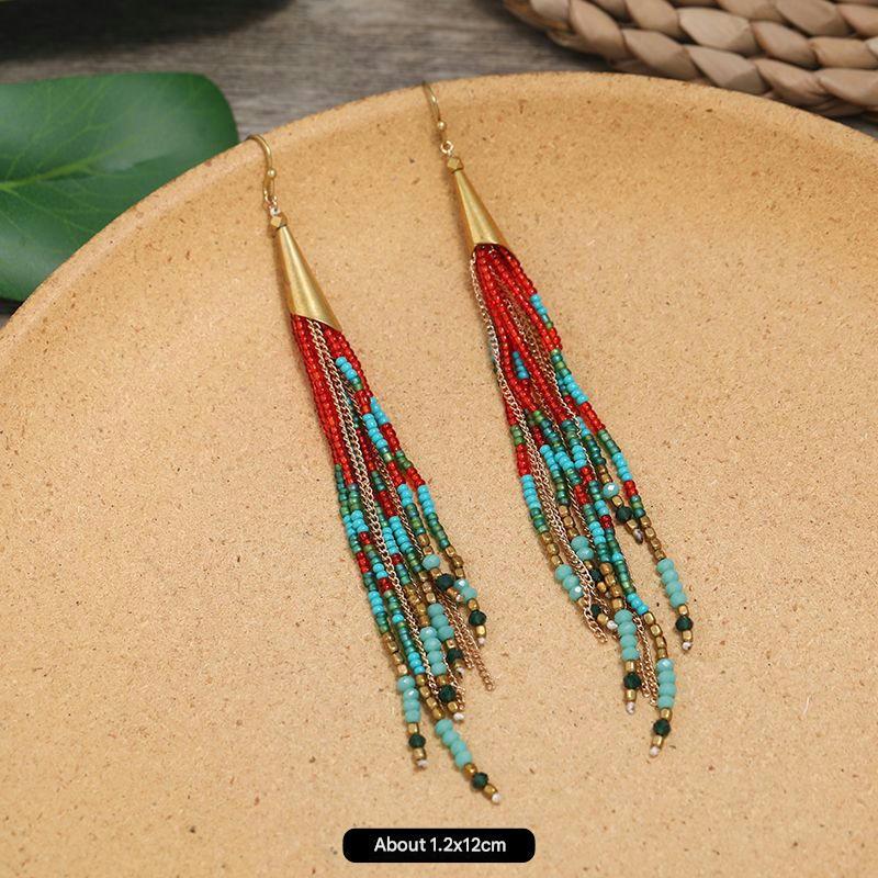 Vibrant crystal earrings close-up image 2