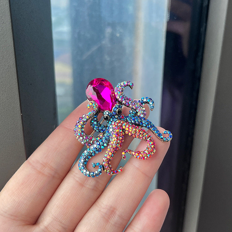 Stylish octopus brooch with rhinestones front view