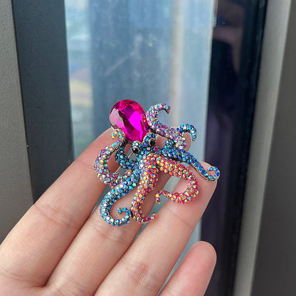 Stylish octopus brooch with rhinestones front view