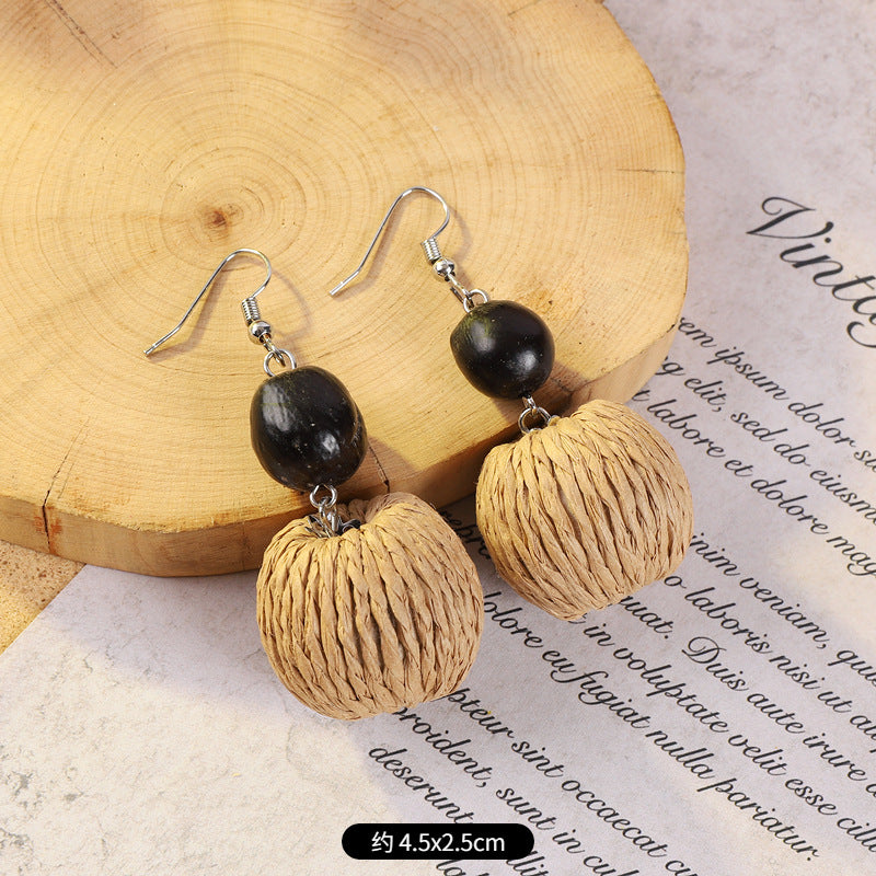 Geometric woven earrings in colorful pattern