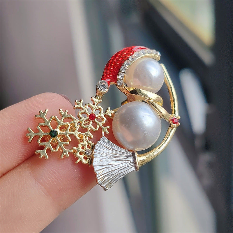 Elegant snowman brooch pearl design