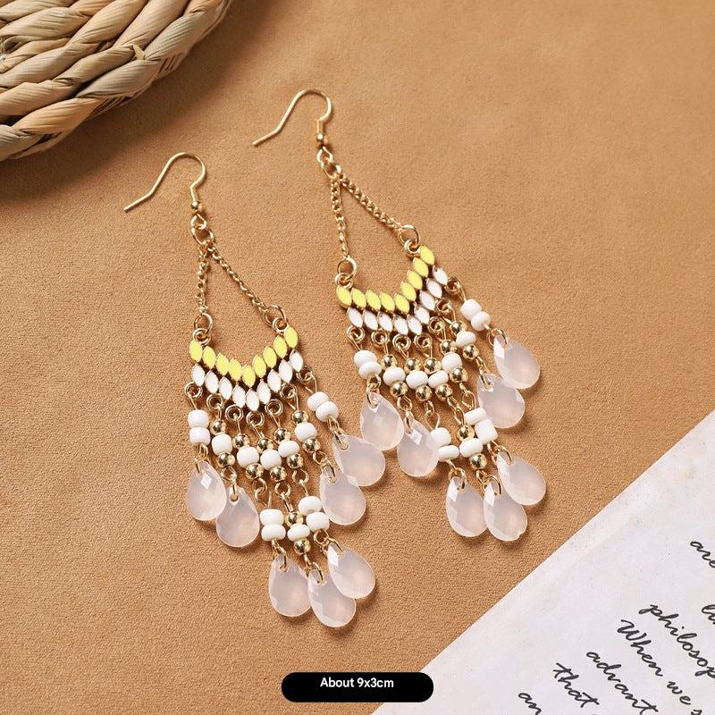 Different style variations of feather earrings