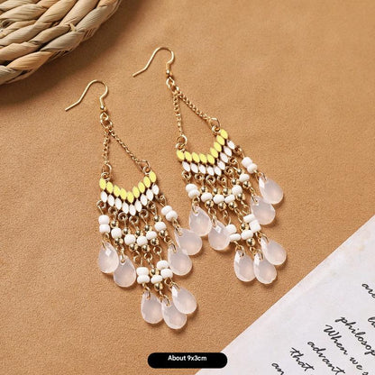 Different style variations of feather earrings