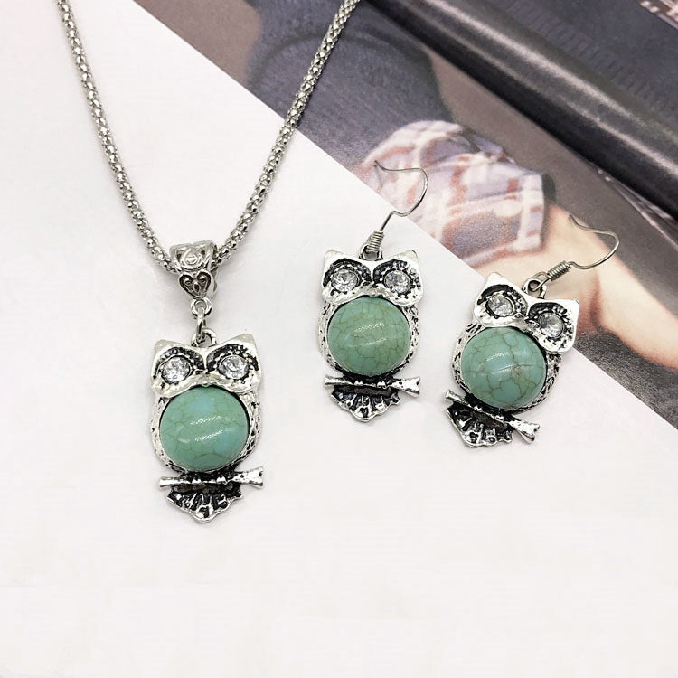 Close-up of turquoise earrings in vintage design - image 2