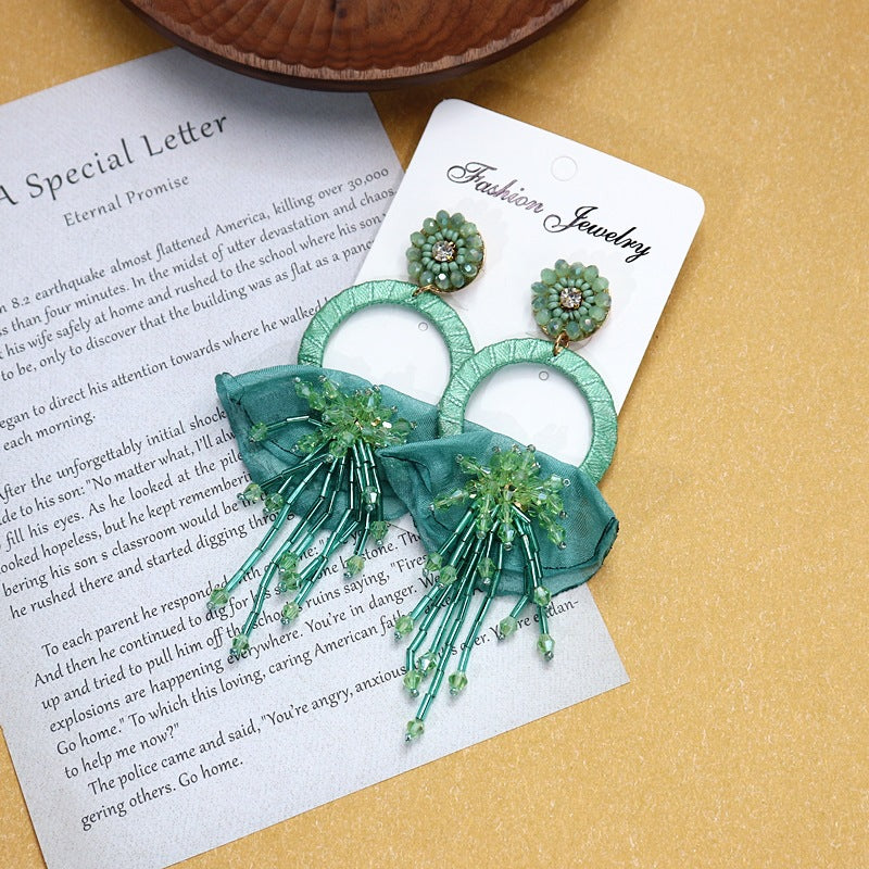 Long drop vintage tassel earrings close-up image 2