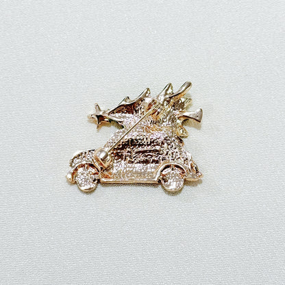 Beautifully designed Christmas Brooch with car and tree