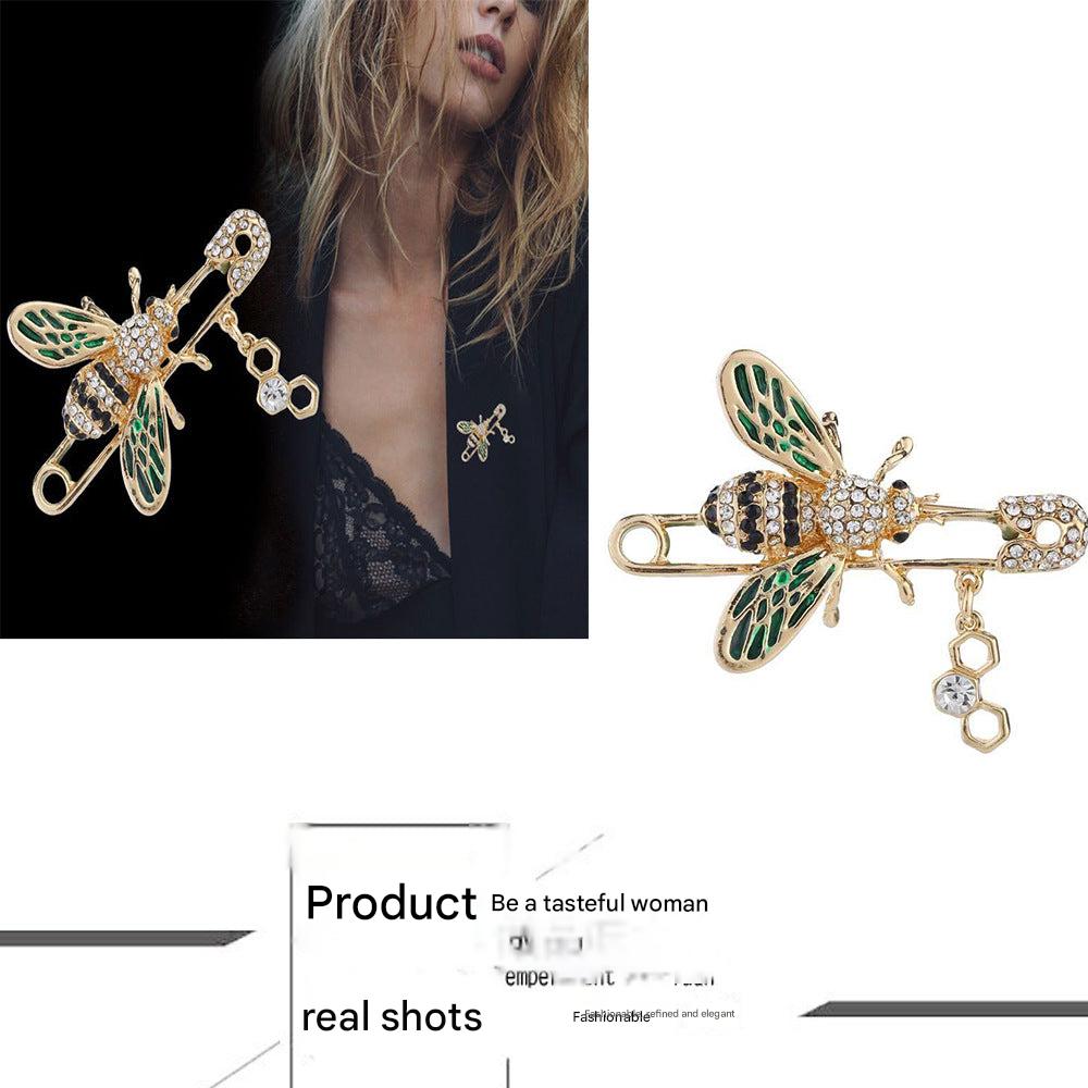 Owl motif pin brooch